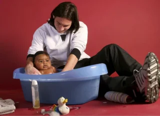 Lionel Messi Bathing a Baby Lamine Yamal | OpenGraph Preview Image